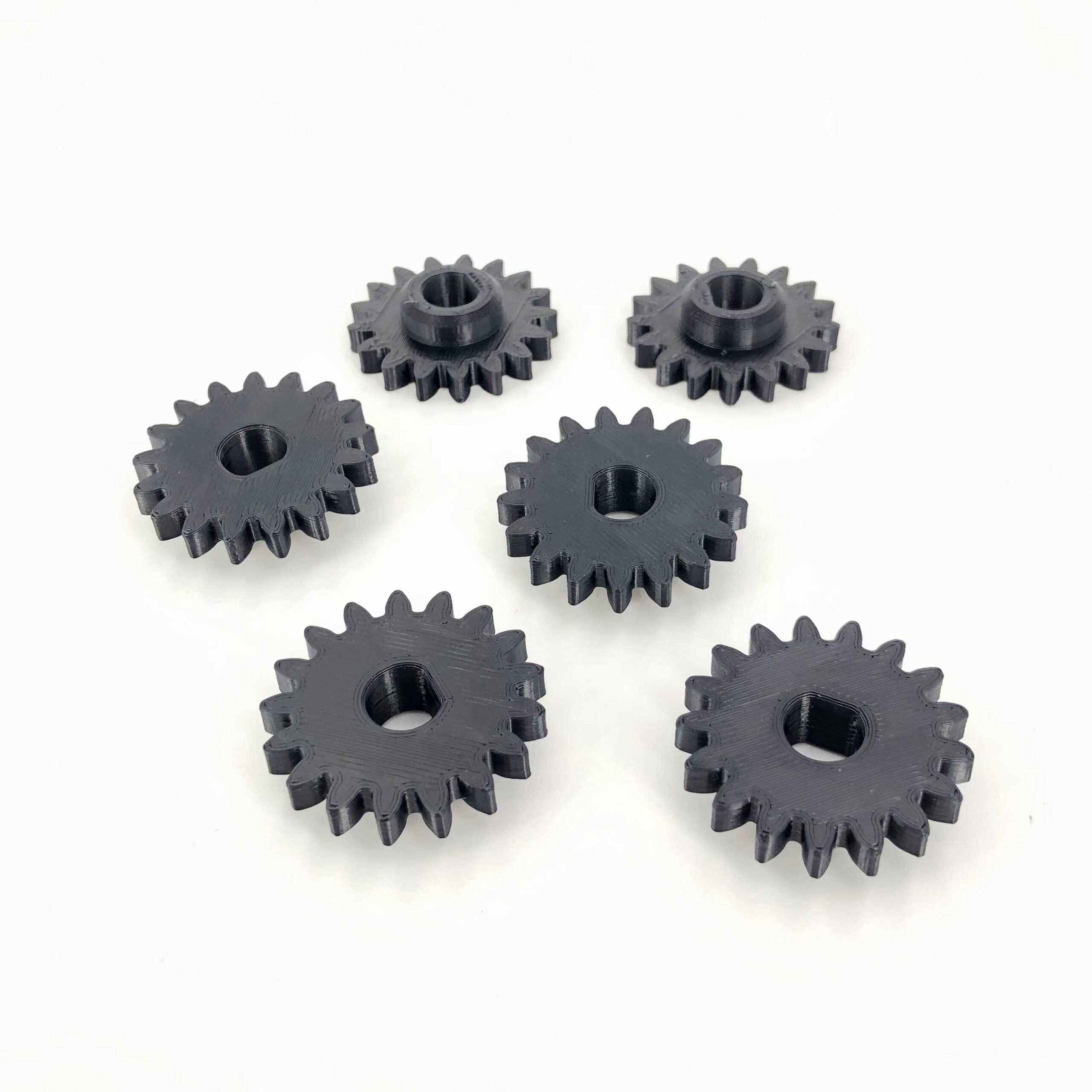 3D printed mechanical gear made of ABS filament in black by a 3D printing service in Sweden